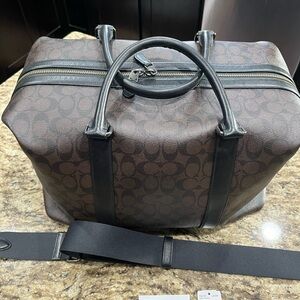 Authentic COACH unisex Voyager overnight luggage bag